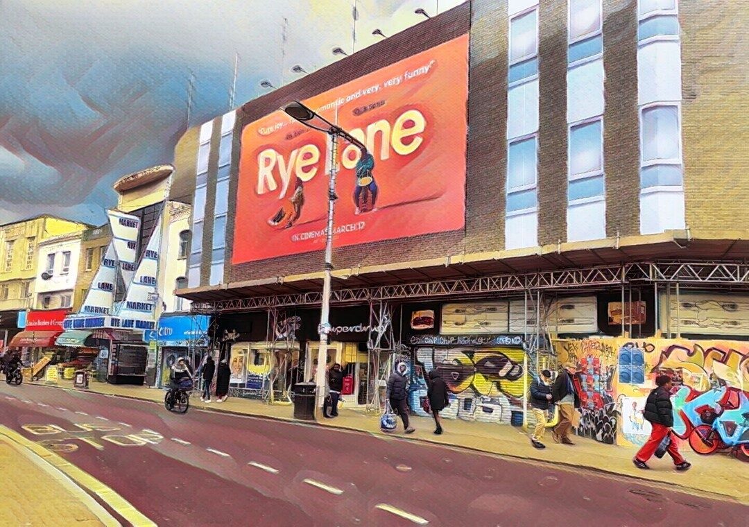Rye Lane street view with the Rye Lane Market sign and the Rye Lane film billboard